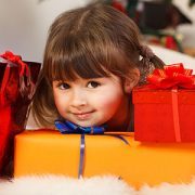 little girl with lots of presents