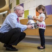 Dr. Kurt Newman with a little girl