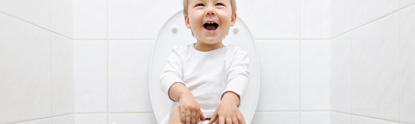 Little boy on toilet