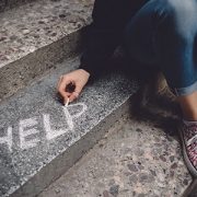 Teen writes help in reference to the state of her mental health and suicide