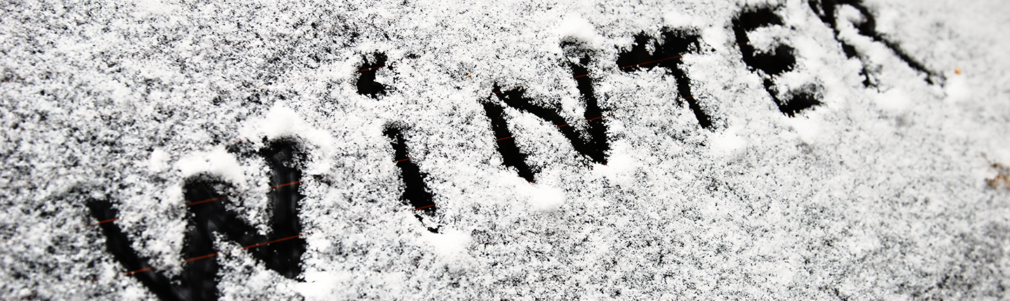 The word winter written in snow