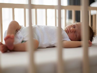 baby sleeping in a crib