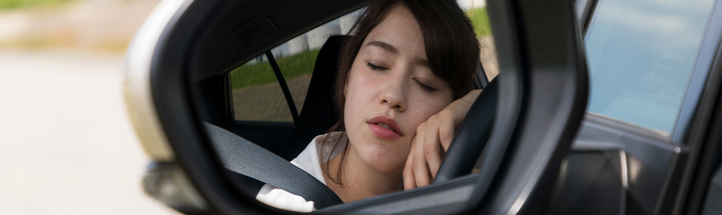 teen girl sleeping in car