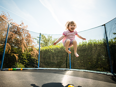 girl jumping on trapoline