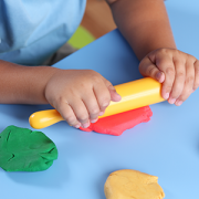 Child playing with Play-Doh