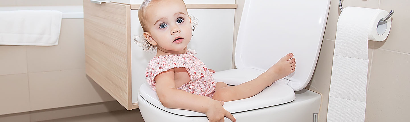 little girl in toilet