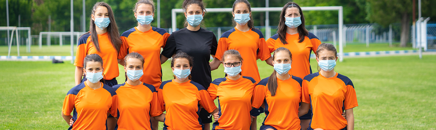 soccer team wearing masks