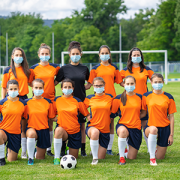 soccer team wearing masks