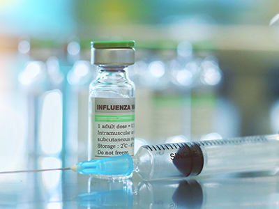 flu vaccine and needle