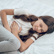 teen girl with stomach ache