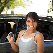 teenage girl holding car keys