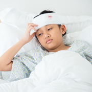 child in bed with head injury