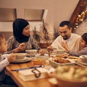 Family sitting down for Ramadan meal