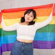 girl holding pride flag