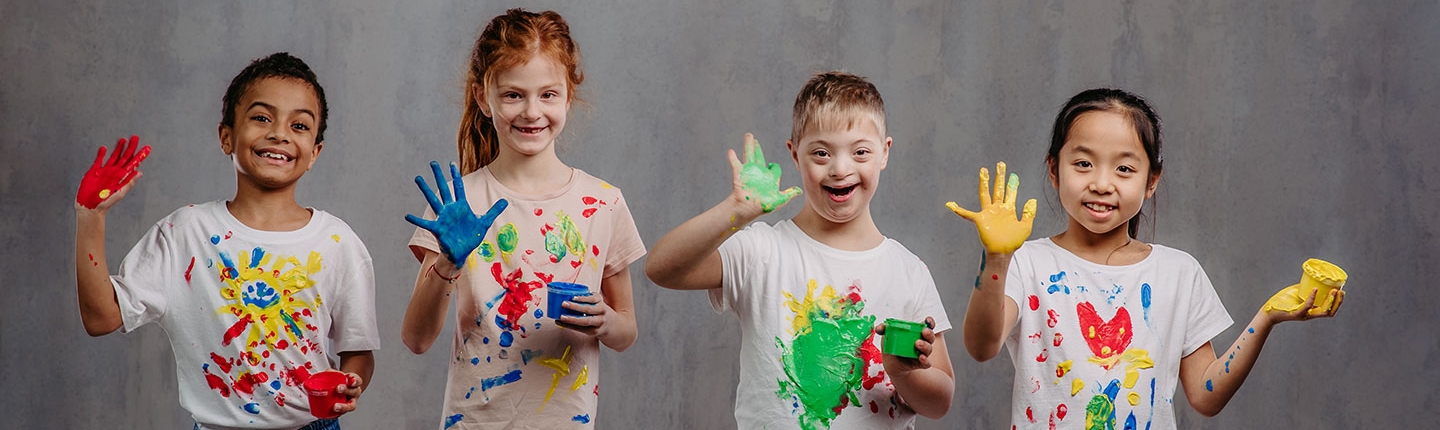 kids with paint on their hands