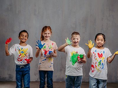 kids with paint on their hands