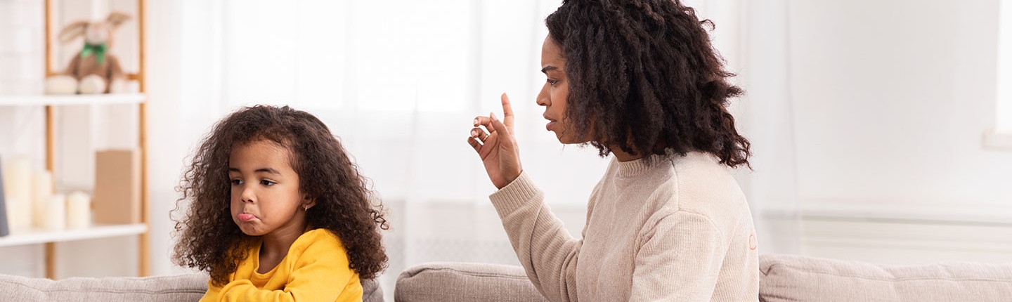 mother scolding child