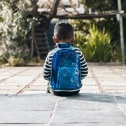 sad boy with backpack