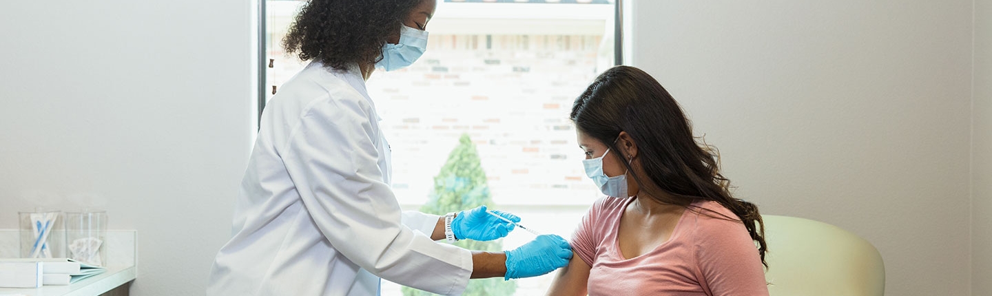 pregnant woman getting vaccine