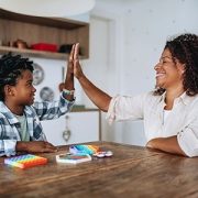 Mom and son high five