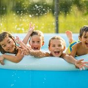 Happy kids in a swimming pool