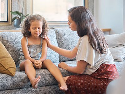 mom talking to daughter