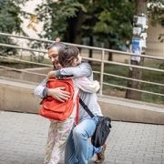 Child and parent hugging