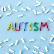 the word autism surrounded by pills