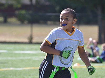 boy with a mouthguard play sports