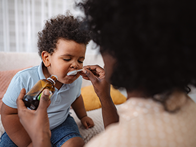 giving child medicine
