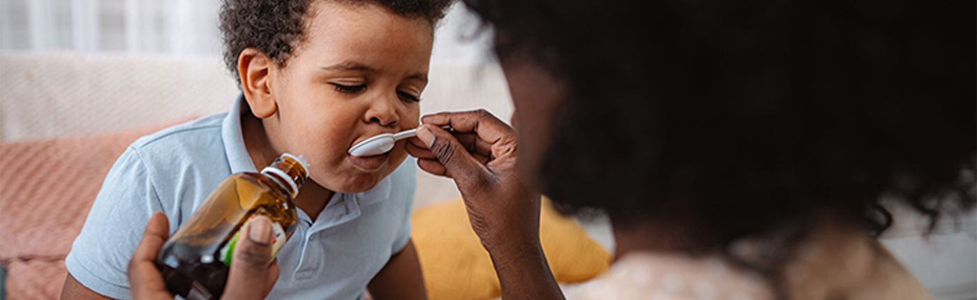 giving child medicine