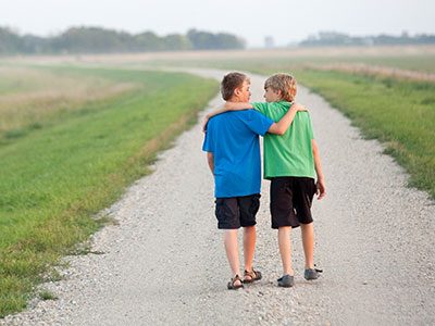 Two friends walking together