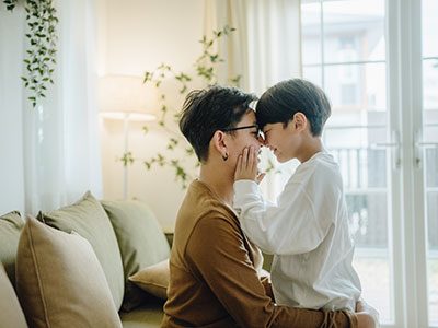 father and son cuddling