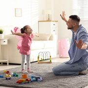 child playing with parent
