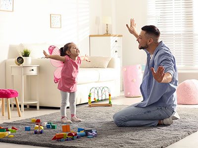 child playing with parent
